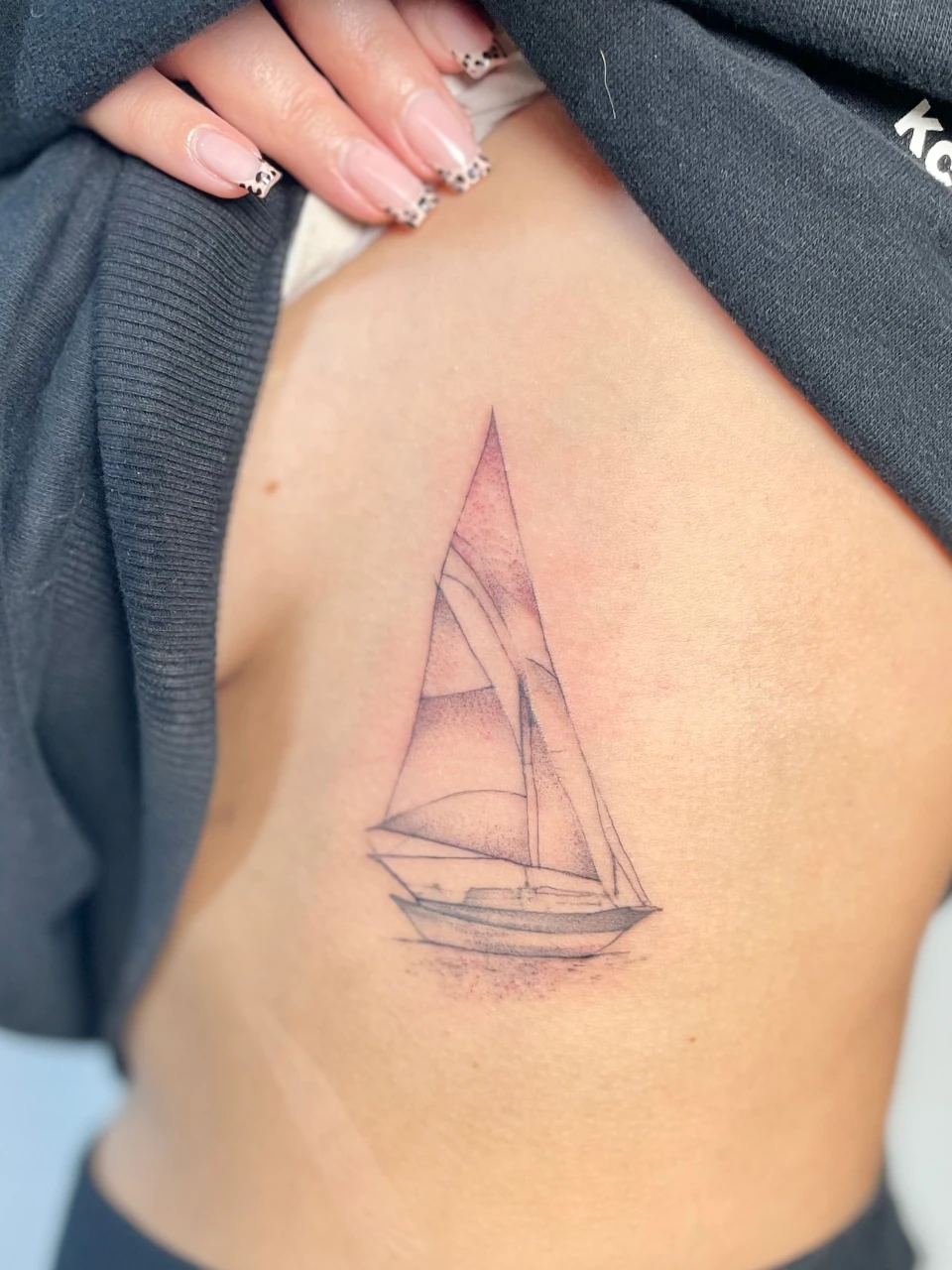 boat fine line tattoo on thigh