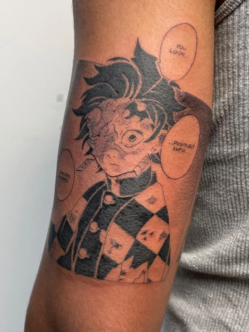 character tattoo on forearm